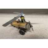 1930s Einfalt clockwork Autogyro, orange/cream striped body with yellow tail, chromed rota blades