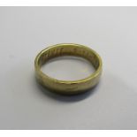 A 14ct gold Dutch wide band ring. Ring size U. Dutch markings 585, inscription to inner band dated