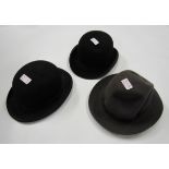 A black bowler hat by Dulcis, together with another black bowler hat and a Tress and Co Gents hat.