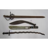 A Machete (relic condition) brought back from Burma by Sgt Major A.C.Smith together with a Kukri and
