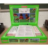 Subbuteo set, two sides red and blue, complete and in virtually mint condition.