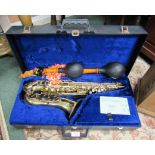 A cased Alto Saxophone Armstrong 3000 (no. 3041) from Elkhart, Indiana and with guarantee card