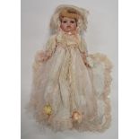 A Stewart Ross Vanity Fair Porcelain Doll with cushion