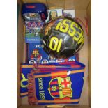 A collection of FC Barcelona football memorabilia, to include a football, scarf, working clock etc.
