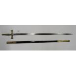 A Masonic sword, the blade length 80cms approx. The blade is in good condition but the etching has