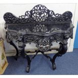 19TH CENTURY ORIENTAL HARDWOOD SIDE TABLE WITH CARVED DECORATION ON SHAPED SUPPORTS