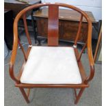 ORIENTAL HARDWOOD HORSESHOE ARMCHAIR