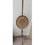 19TH CENTURY MAHOGANY POLE SCREEN WITH BALL AND CLAW SUPPORTS,