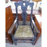 19TH CENTURY CARVED OAK OPEN ARMCHAIR 113CM TALL