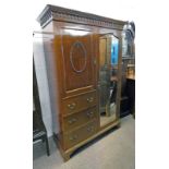 EARLY 20TH CENTURY MAHOGANY WARDROBE THE MIRROR DOOR FLANKED BY A PANEL DOOR OVER 3 DRAWERS ON