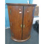 19TH CENTURY BOW FRONTED OAK CORNER CUPBOARD CIRCA 1800 WITH SHELVED INTERIOR