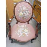 EARLY 20TH CENTURY MAHOGANY ARMCHAIR WITH DECORATIVE SEWN WORK PANEL ON SHAPED SUPPORTS