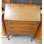 EARLY 20TH CENTURY MAHOGANY BUREAU WITH FALL FRONT OVER 3 DRAWERS ON SHAPED SUPPORTS