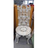 CAST IRON GARDEN CHAIR WITH MASK DECORATION Condition Report: The items paint is