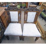 PAIR OF LATE 19TH CENTURY OAK HALL CHAIRS WITH CARVED DECORATION