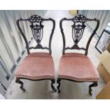 2 EARLY 20TH CENTURY MAHOGANY CHAIRS WITH DECORATIVE BACKS AND SHAPED SUPPORTS