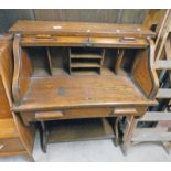 EARLY 20TH CENTURY OAK ROLL TOP DESK WITH TAMBOUR FRONT OVER SINGLE DRAWER