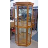 LATE 20TH CENTURY TEAK CORNER DISPLAY CASE WITH 2 GLAZED PANEL DOORS