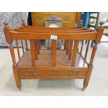 20TH CENTURY MAHOGANY CANTERBURY WITH DRAWER ON TURNED SUPPORTS