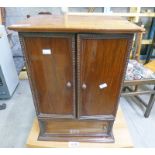 2 DOOR MINIATURE MAHOGANY CABINET WITH 2 PANEL DOORS,