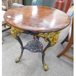 MAHOGANY TOPPED TABLE WITH DECORATIVE CAST IRON BASE 72CM TALL Condition Report: The