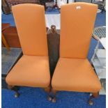 PAIR OF HALL CHAIRS WITH HIGH BACKS AND SHAPED OAK SUPPORTS