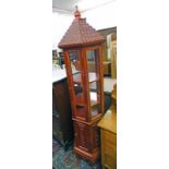 OCTAGONAL PAGODA STYLE CABINET WITH GLASS PANEL TOP OVER CARVED DECORATED BASE