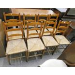 SET OF 8 EARLY 20TH CENTURY LADDERBACK CHAIRS WITH RUSHWORK SEATS
