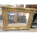 GILT FRAMED MIRROR WITH DECORATIVE FRAMED 128 X 97 CM