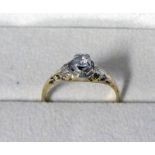 DIAMOND SET SOLITAIRE RING IN YELLOW METAL MOUNT