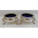 2 SILVER SALTS WITH BLUE GLASS LINERS,