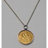 1908 HALF SOVEREIGN IN 9CT GOLD MOUNT ON CHAIN Condition Report: Weight: 6.