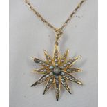 9CT GOLD PEARL SET STAR PENDANT ON 9CT GOLD CHAIN