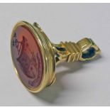 YELLOW METAL FOB WITH ENGRAVED CORNELIAN SEAL Condition Report: Seal section is a