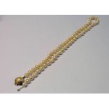 CULTURED PEARL NECKLACE 44 CMS WITH CLASP MARKED 9CT WITH 59 PEARLS