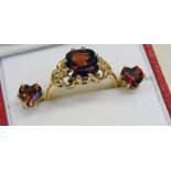 9CT GOLD GARNET SET RING & A PAIR OF GARNET SET EARRINGS