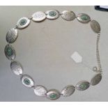 WHITE METAL BELT WITH GREEN CABACHON STONES OVERALL LENGTH 116 CMS