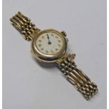 9CT GOLD CASED WRIST WATCH ON BRACELET MARKED 9CT. TOTAL WEIGHT 27.