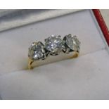 18CT GOLD 3 STONE DIAMOND SET RING. THE 3 BRILLIANT CUT DIAMONDS TOTALLING 2.15 CARAT APPROX.