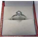 DIAMOND SINGLE STONE RING IN A PLATINUM SETTING, THE BRILLIANT CUT DIAMOND OF APPROX 0.