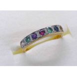 18CT GOLD 7-STONE "DEAREST" RING SET WITH DIAMOND, EMERALDS, AMETHYST, RUBY,