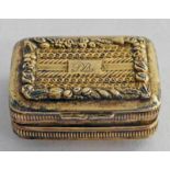 GEORGE III SILVER-GILT VINAIGRETTE WITH FOLIATE EMBOSSED DECORATION AND PIERCED GILT GRILLE,