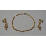 YELLOW METAL BRACELET MARKED 916. LENGTH 19.5 CMS.