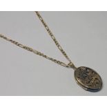 9CT GOLD OVAL LOCKET ON 9CT GOLD CHAIN 9.