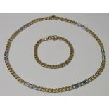 YELLOW METAL NECKLACE AND BRACELET WITH CERTIFICATE AND MARKED 585 LENGTH 45 CM AND 18 CMS TOTAL