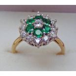 EMERALD & DIAMOND CLUSTER RING IN SETTING MARKED 18CT & PLAT
