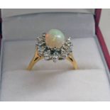 18CT GOLD OPAL & DIAMOND SET CLUSTER RING,