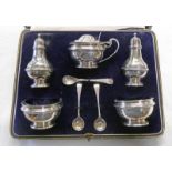 CASED SILVER CRUET SET,