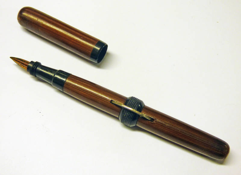 A BAMBOO BODIED CRESCENT FILL PEN WITH GLASS NIB, CRESCENT MARKED 'MADE IN JAPAN', 13.