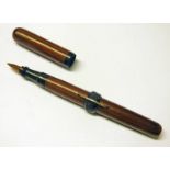 A BAMBOO BODIED CRESCENT FILL PEN WITH GLASS NIB, CRESCENT MARKED 'MADE IN JAPAN', 13.